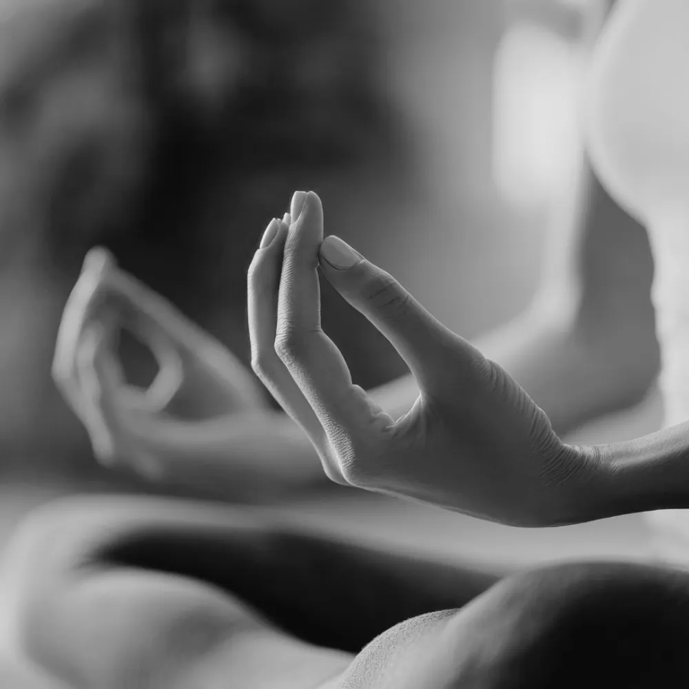 A yoga student meditating
